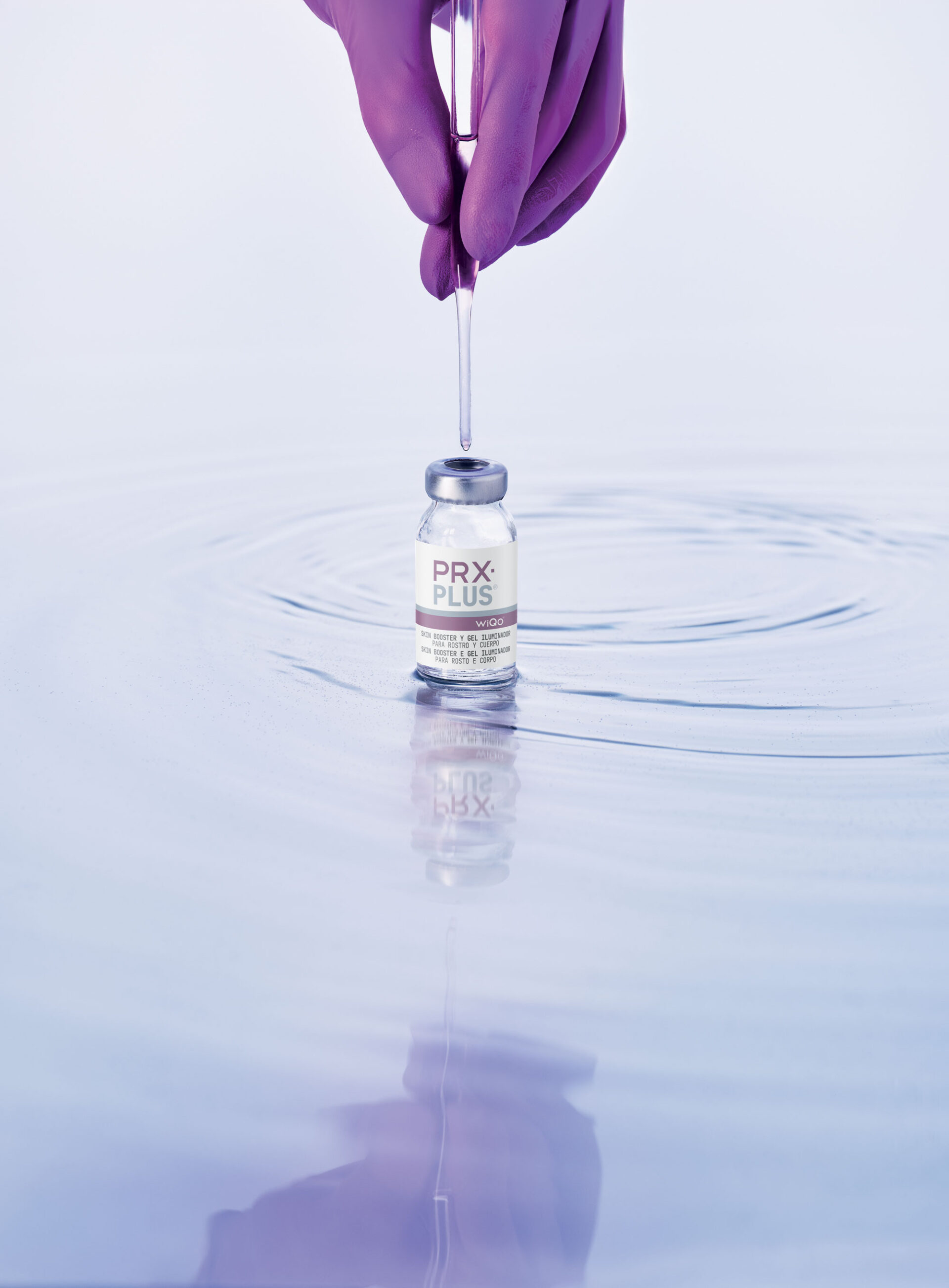 WiQo PRX-T33 vial on a liquid surface